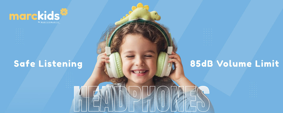Little girl listening to music using marckids protected sound headphones